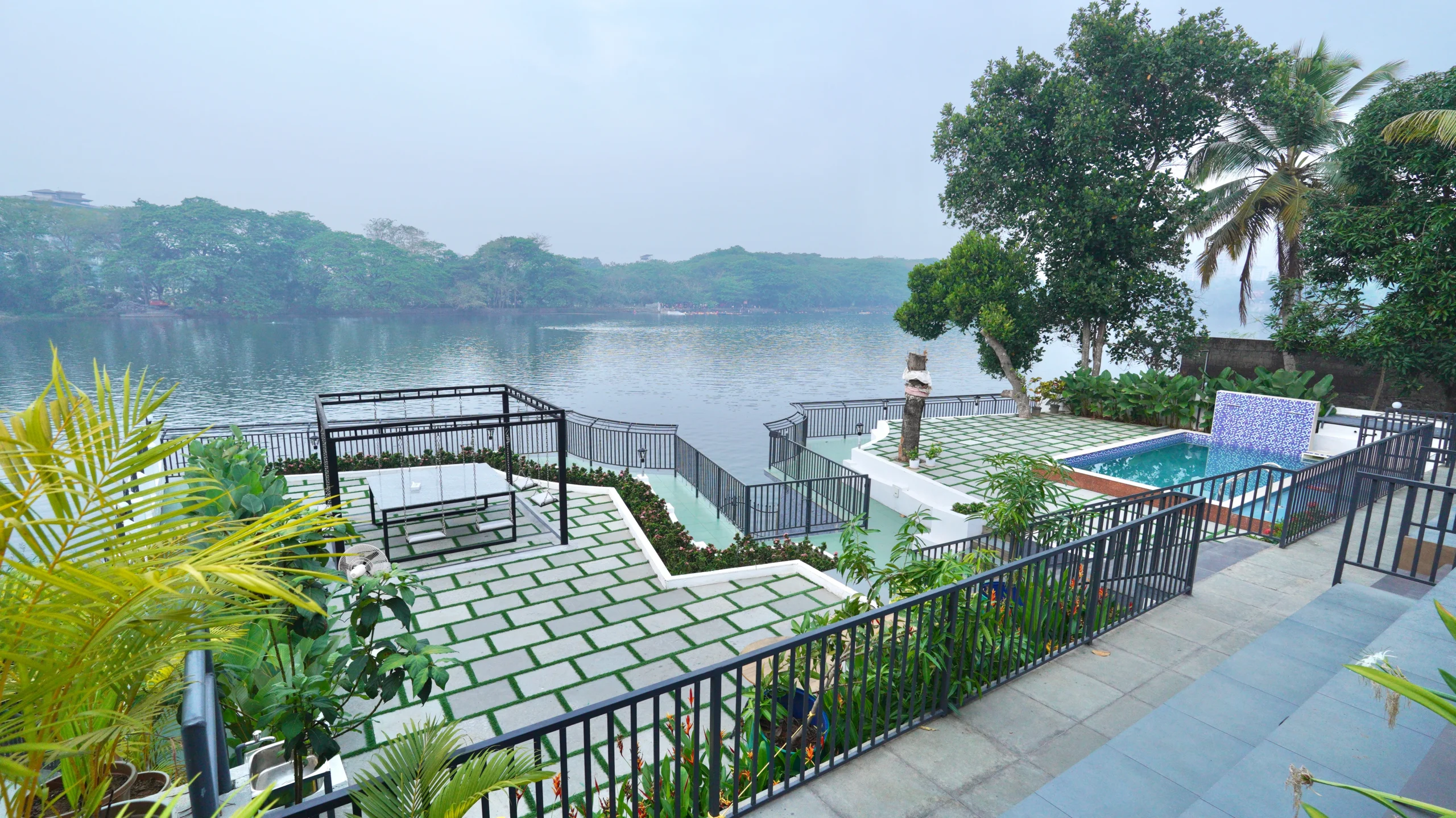 Riverside homestay Kochi with beautiful lake view and garden at periyar vibes