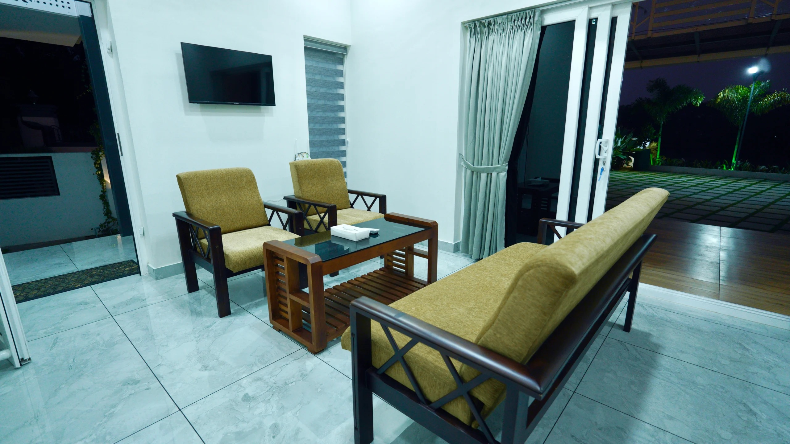 beautiful cozy living area with outside view at private pool villa